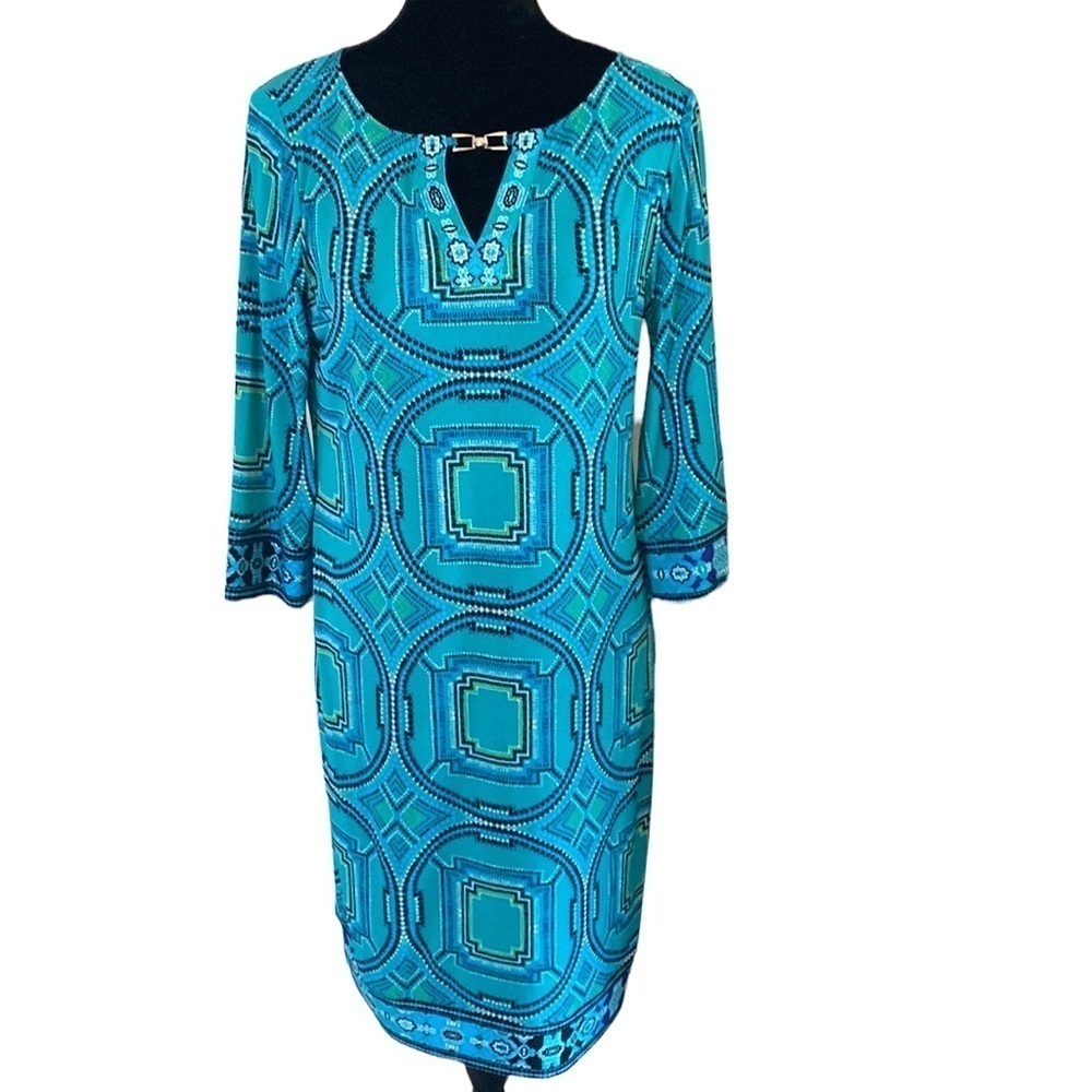 Chicos size 0 (equivalent to an 8) 38” bust and waist x 36” length w 3/4 sleeve